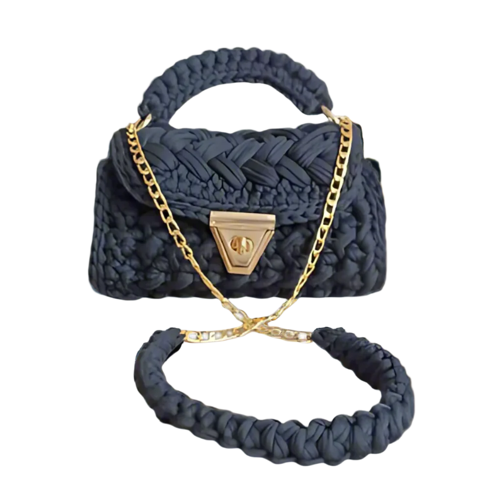 Noir Étoile crochet handbag styled as a shoulder bag.