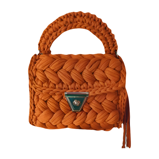 Sunset-inspired burnt orange crochet bag with gold hardware - Brunch at Tiffany’s summer collection