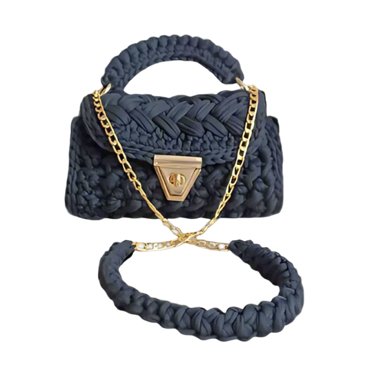 Noir Étoile crochet handbag styled as a shoulder bag.